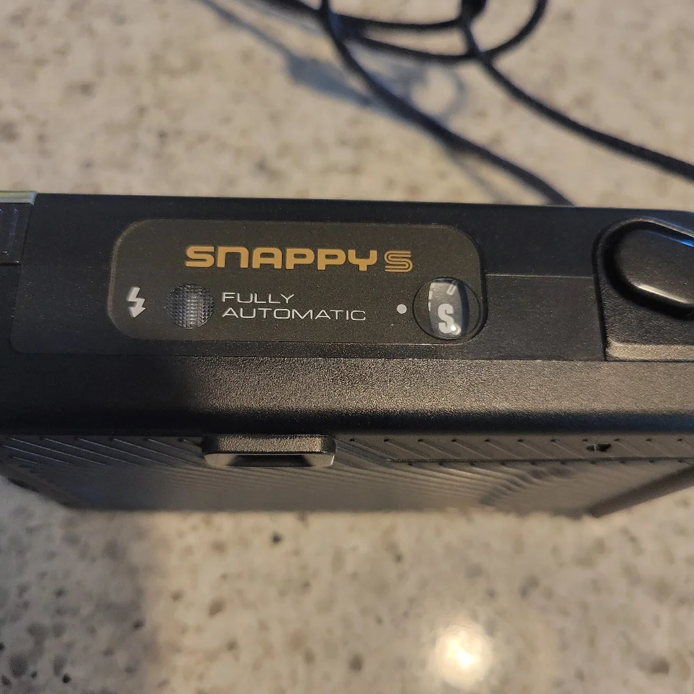 Vintage Canon Snappy-S 35 mm Film Camera, Fully Automatic Point and Shoot.